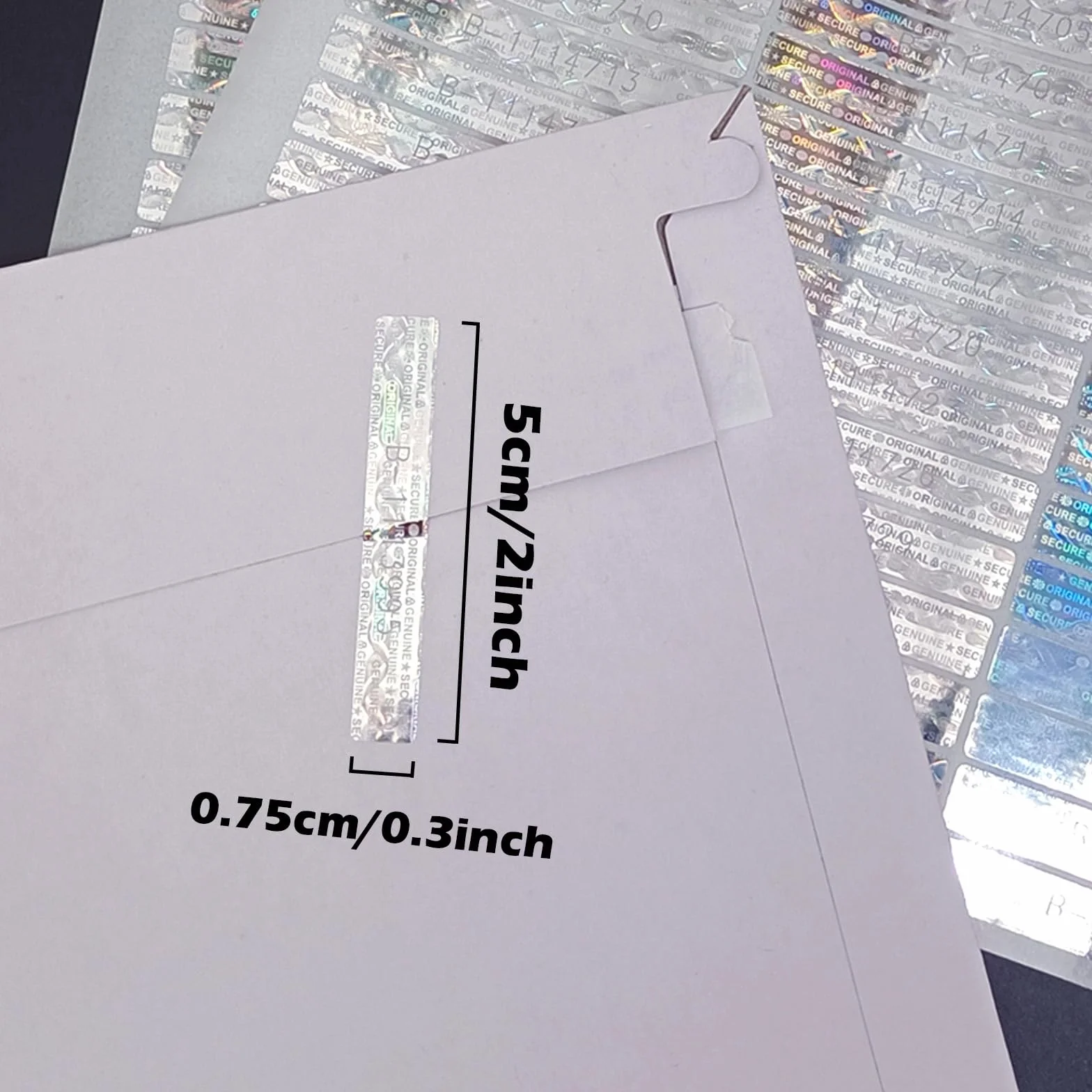 200 sztuk naklejek zabezpieczających przed manipulacją, pieczątka gwarancyjna z numerem seryjnym, naklejki hologramowe, 50 x 7,5 mm (srebrne)